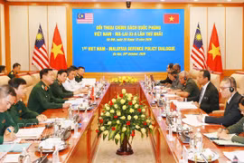 Lors du premier Dialogue sur les politiques de défense Vietnam-Malaisie. Photo : VNA