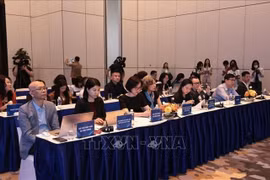 Des représentants des bureaux commerciaux vietnamiens à l’étranger lors de la Coférence. Photo : VNA