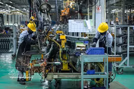 THACO mise sur un déploiement massif de technologies de pointe et d’équipements modernes pour booster la productivité et la qualité de sa gamme automobile. Photo : VNA