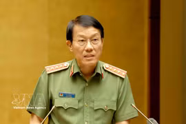Le général Luong Tam Quang, membre du Politburo et ministre de la Sécurité publique lors de la conférence nationale pour diffuser et mettre en œuvre les résolutions adoptées lors du troisième Plénum du Comité central du Parti du 14e mandat, le 29 juillet. Photo : VNA