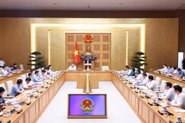 Vue d’ensemble de la conférence faisant le bilan d’un mois de fonctionnement de ce système, à Hanoi, le 28 juillet. Photo : VNA