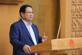 Le Premier ministre Pham Minh Chinh s’exprime lors de la réunion, à Hanoi, le 23 août. Photo : VNA