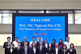 La délégation du ministère vietnamien des Finances au Japon, le 14 juilet. Photo: SSC/VNA