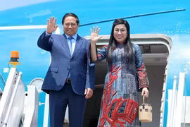 Le Premier ministre Pham Minh Chinh et son épouse. Photo : VNA