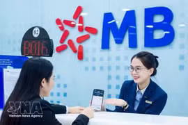 Vietnam Report dévoile le classement des 50 entreprises publiques les plus prestigieuses et performantes pour 2026, dont MBBank. Photo : VNA