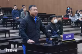L’accusé Nghiêm Quang Minh lors de son procès devant le Tribunal populaire de Hanoi. Photo : VNA