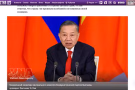 Article sur la visite visite d’État en Russie du secrétaire général et président Tô Lâm sur iz.ru. Photo: VNA