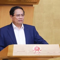 Le Premier ministre, Pham Minh Chinh s'exprime lors de la réunion. Photo: VNA