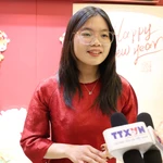 De nombreux étudiants vietnamiens en Chine expriment leur intérêt pour cet événement politique majeur. Photo: VNA