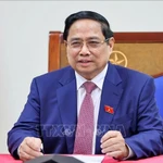 Le Premier ministre vietnamien Pham Minh Chinh s'entretient par téléphone avec Alexeï Likhatchev, directeur général de Rosatom. Photo: VNA