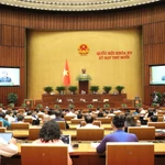 Le président de la Cour populaire suprême du Vietnam, Le Minh Tri, présente le rapport d’activités de la Cour pour le mandat 2021-2026. Photo: VNA