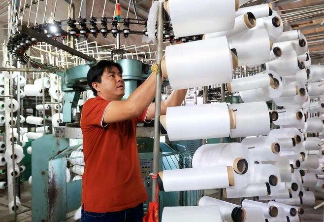 Le Vietnam et l’Inde disposent d’un fort potentiel de coopération dans le secteur du textile-habillement. Photo : VNA