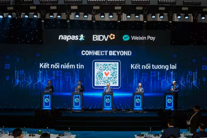Cérémonie d'annonce de l'extension du service de paiement transfrontalier par QR code entre le Vietnam et la Chine. Photo: NAPAS