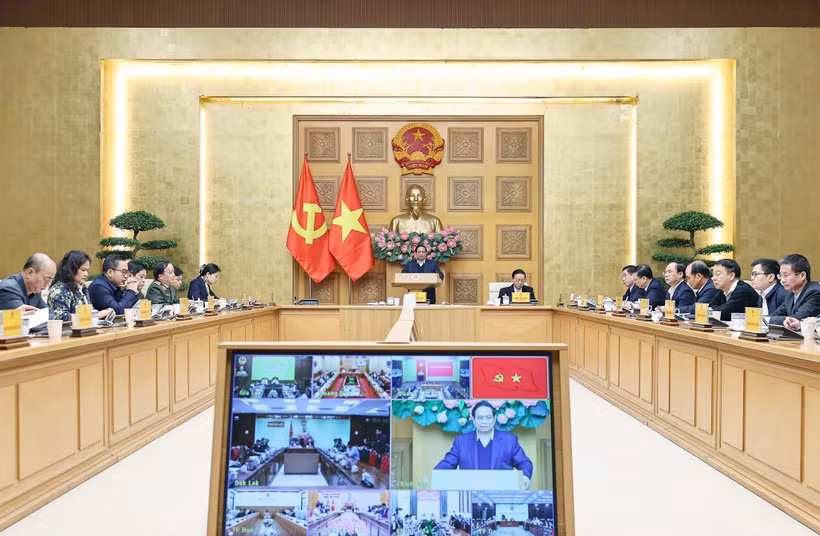 Le Premier ministre Phạm Minh Chính a présidé, le 7 janvier, une conférence en ligne pour évaluer la mise en œuvre de la « Campagne Quang Trung ». Photo : VNA