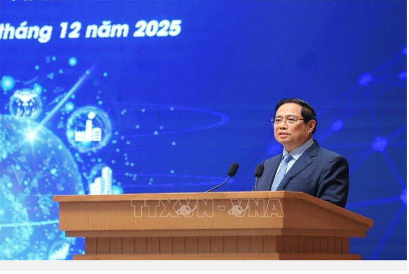 Le Premier ministre Pham Minh Chinh au IIIᵉ Forum national sur le développement de l’économie et de la société numériques, organisé en présentiel et en ligne avec les 34 villes et provinces. Photo : VNA