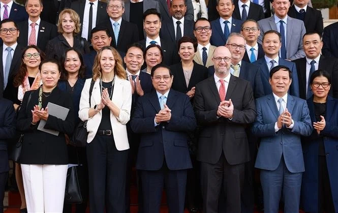 Le Premier ministre Pham Minh Chinh a présidé samedi matin 1er mars à Hanoï un échange de vue avec des entreprises américaines. Photo : VNA