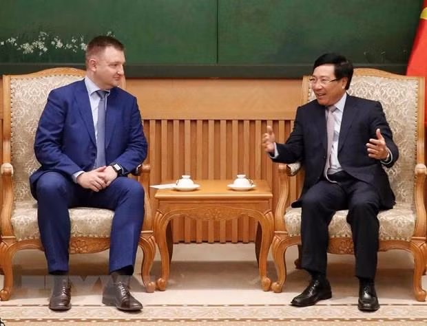 Le vice-PM et ministre des AE Pham Binh Minh reçoit une délégation russe ảnh 1