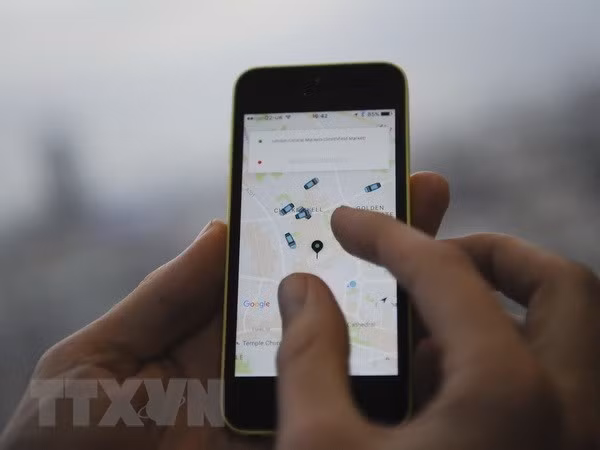 Uber céderait ses activités en Asie du Sud-Est à Grab ảnh 1