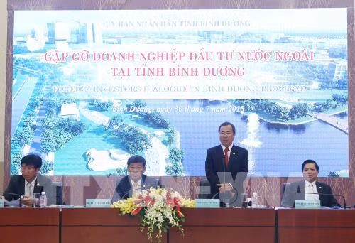 Dialogue avec des entreprises à participation étrangère à Binh Duong ảnh 1