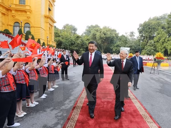 Le Vietnam et la Chine concluent 19 accords de coopération ảnh 1