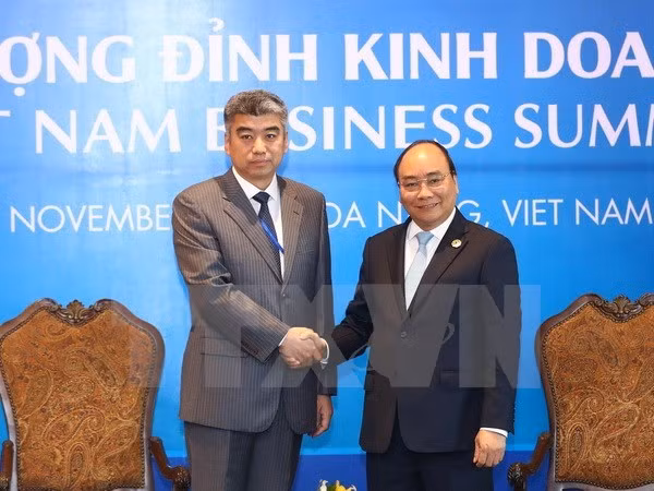 APEC 2017 : le PM reçoit des hommes d’affaires étrangers ảnh 1