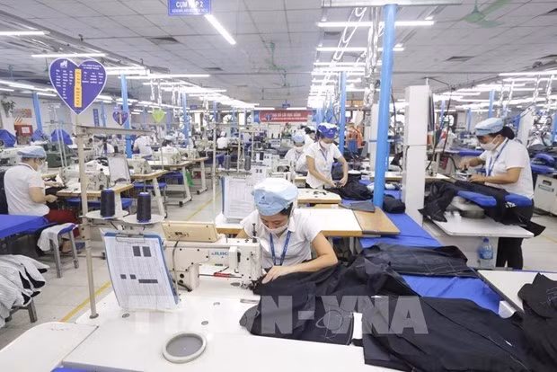 Textile: signature du premier protocole d'accord entre l'ASEAN, la Chine et Hong Kong (Chine) ảnh 1