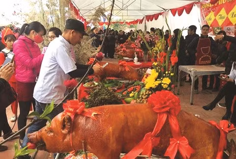 Originalité des fêtes du cochon rôti à Lang Son ảnh 1
