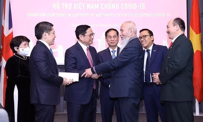 Le PM Pham Minh Chinh rencontre la communauté vietnamienne au Royaume-Uni et en Irlande ảnh 3