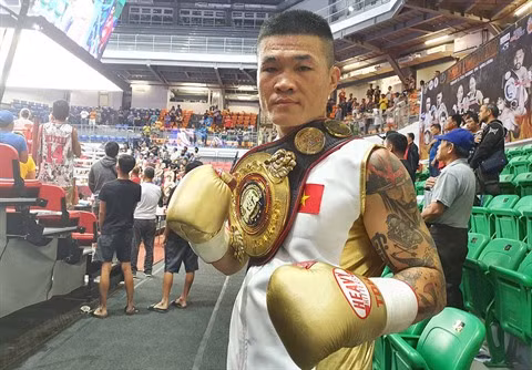 Truong Ðình Hoàng, roi de la boxe ảnh 2