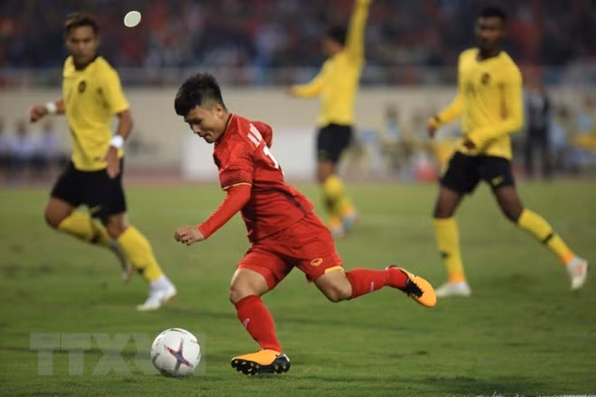 Quang Hai nommé meilleur joueur de l’AFF Suzuki Cup 2018 ảnh 1