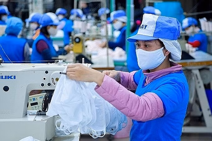 Le Vietnam peut devenir un grand producteur de masques en tissu ảnh 1
