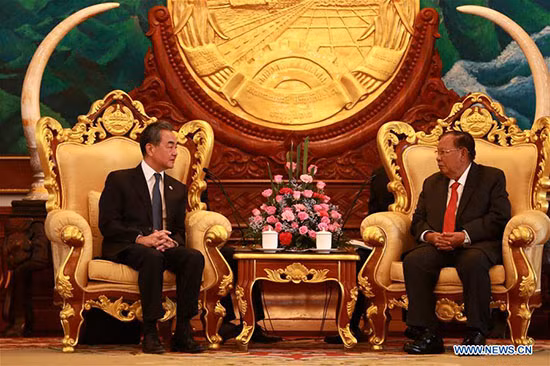 Le secrétaire général du PPRL et président laotien reçoit le ministre chinois des AE ảnh 1