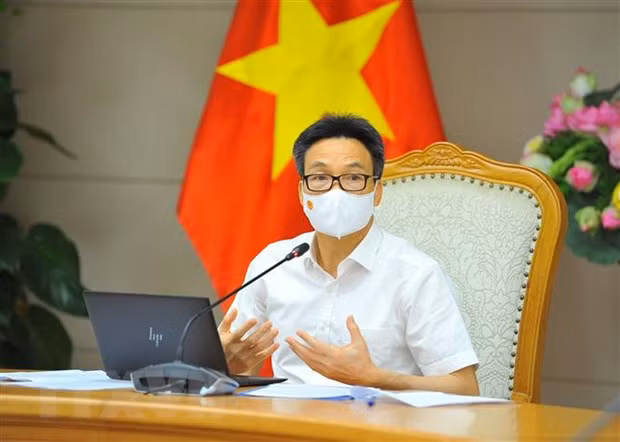 COVID-19 : au moins un vaccin produit au pays sera autorisé ảnh 1