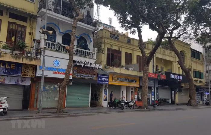 COVID-19: l'interdiction des rassemblements dans les lieux publics à Hanoï ảnh 1