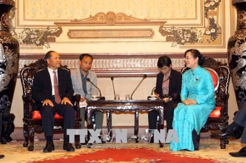 Laos et Vietnam partagent des expériences dans la gestion foncière ảnh 1