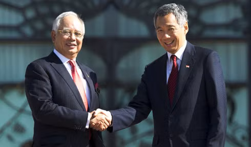 Malaisie et Singapour signent un accord sur la construction d'un chemin de fer à grande vitesse ảnh 1