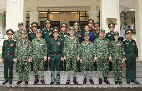 Le président Trân Dai Quang travaille avec le ministère de la Défense ảnh 2