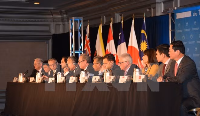 Adoption d'une résolution sur la signature du TPP ảnh 1
