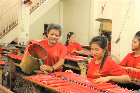 Châu Dôc : Fabrication de chandelles, un métier inoubliable ảnh 1 Châu Dôc : Fabrication de chandelles, un métier inoubliable ảnh 1