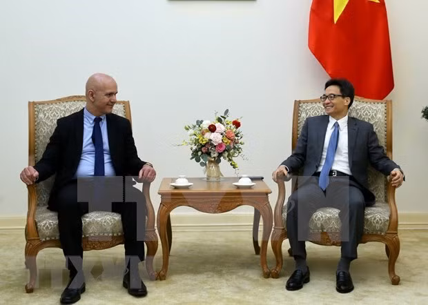 Le vice-PM Vu Duc Dam reçoit le secrétaire général de l’AISS ảnh 1