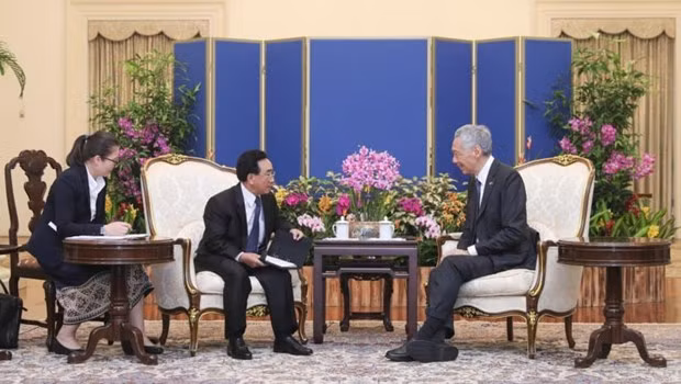 Singapour et le Laos renforcent leur coopération dans les domaines émergents ảnh 1
