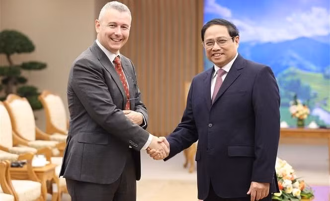 Le PM Pham Minh Chinh reçoit l’ambassadeur de Belgique au Vietnam Karl Van Den Bossche ảnh 1