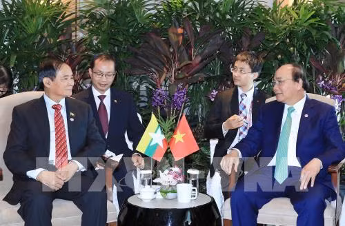 Le PM rencontre les présidents indonésien et birman à Singapour ảnh 2 Le PM rencontre les présidents indonésien et birman à Singapour ảnh 2