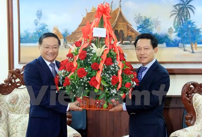 Félicitations aux dirigeants du Parti, de l’Etat, du gouvernement et de l’AN du Laos ảnh 1