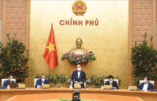 Le Premier ministre appelle à une forte réponse locale au COVID-19 ảnh 1