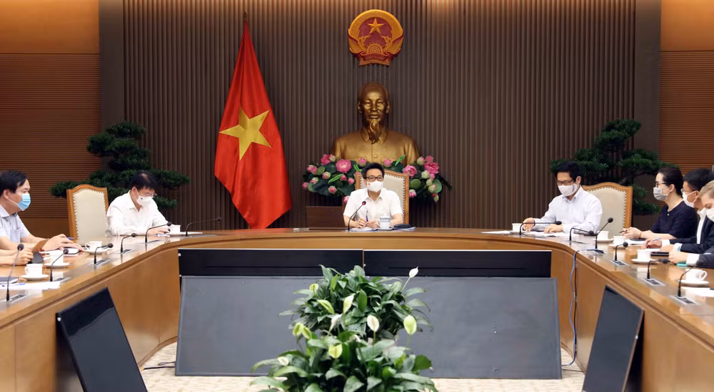 Le vice-PM Vu Duc Dam rencontre des entreprises soutenant le Fonds de vaccination contre le COVID-19 ảnh 2 Le vice-PM Vu Duc Dam rencontre des entreprises soutenant le Fonds de vaccination contre le COVID-19 ảnh 2