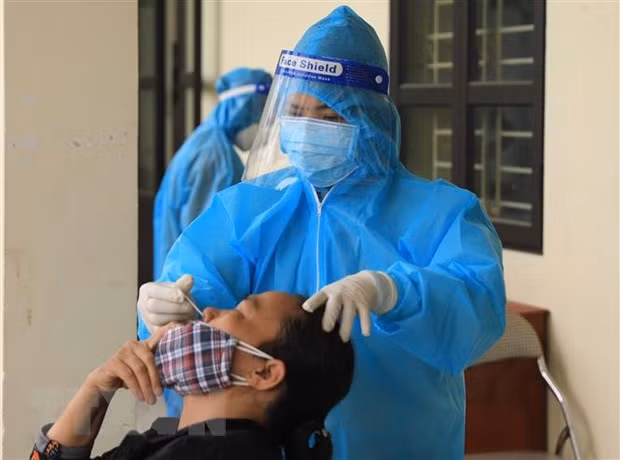 Covid-19 : le Vietnam enregistre 164.596 nouveaux cas en 24 heures ảnh 1