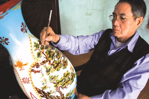 Un nouveau style de laques pour exprimer la tradition à Cat Dang ảnh 1