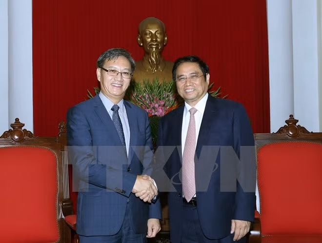 Un responsable du PCV reçoit l’ambassadeur du Laos ảnh 1