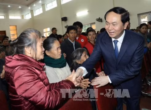 Le président Tran Dai Quang formule ses vœux du Tet à Nghe An ảnh 1